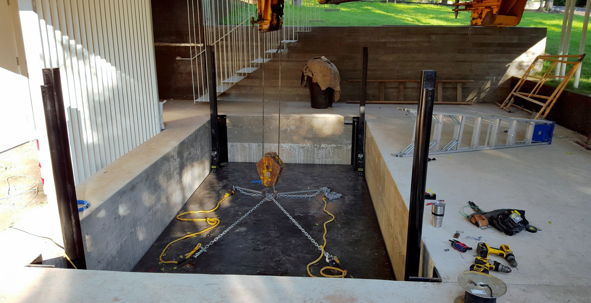 The Benefits of Integrating Underground Car Lifts Into Your Luxury Home Plans